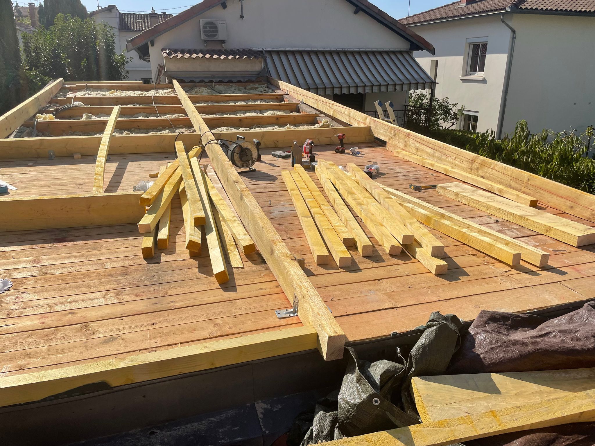 Travaux sur les éléments en bois de charpente